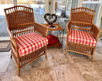 2 of 4 Matching wicker patio chairs - the other 2 chairs have blue seat cushions