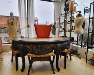 Regal, ornate round office desk