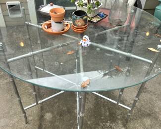 #61 - $150 - Cast iron base spray painted silver Round Table 40"R glass top