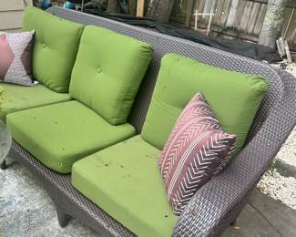 #53 - $200 - All Weather Wicker Couch with green Sunbrella cushions 80"Lx34"Dx35"H as is