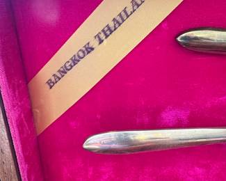 #106 - $150 - Bangkok Thailand Gold color flatware - 12 tea spoons - 12 soup spoons - 12 dinner spoons - 1 oyster spoon - 12 dinner knives - 12 butter knives - 12 - caviar spoons - 12 small knives - 10 serving utensils