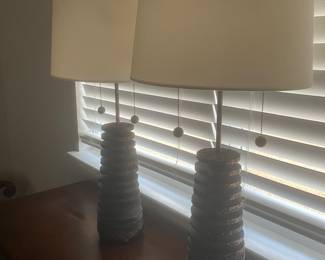 #43 $160	2 concrete lamps 33hx14w
	from DUH 
