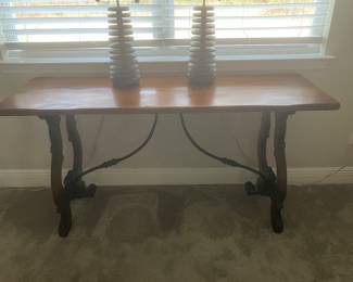 #42 $380	Wood wrought Iron foyer table 59wx19dx30h  iron stretcher from DUH	
