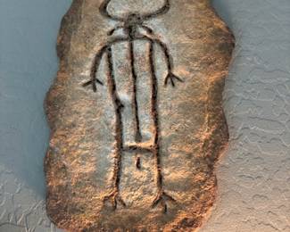 Carved stone wall art