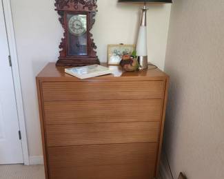 dresser, lamp, clock