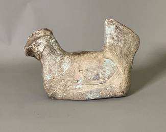 Antique carved stone chicken
