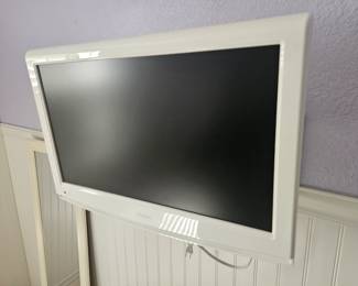 DVD TV with wall bracket 
$60 bring tools to remove