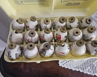 Dozen vintage ceramic decorative egg ornaments $75