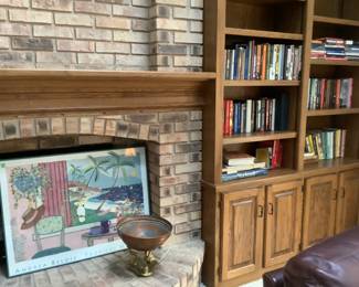 Art work, large copper pedestal bowl and many books