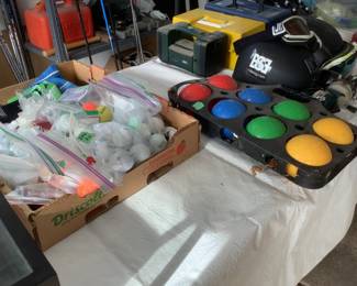Golf balls and Bocce ball set