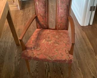 One of the arm chairs showing the split back