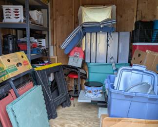 A shed full of outdoor items, tools etc
