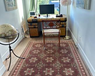 Office - desk, chair, globe, floor lamp, decorative rug