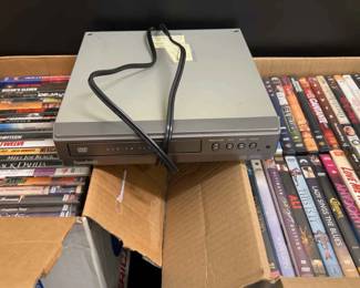 Boxes Of DVDs And Player