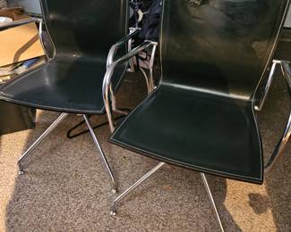 These two black swivel chairs I guess could be used as desk chairs could you tell they have a theme here folks? These are practically new. $60 for both