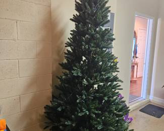 7ft tall LED Holiday tree push button on floor to activate, comes with storage bag
$75.00/ discount price is $40