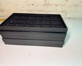 An assortment of jewelry trays