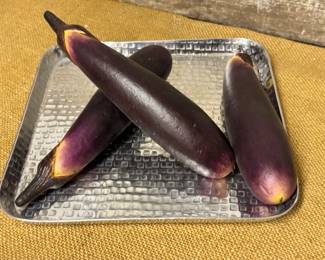 Just eggplants on a nice silver tray….