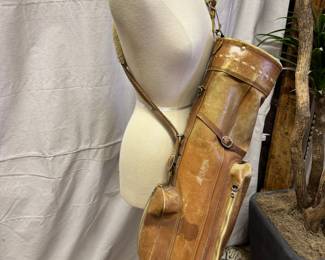 The coolest leather golf bag ever!  Fur strap in good condition as are the zippers!
