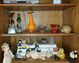 Glass decor, old dolls, pottery
