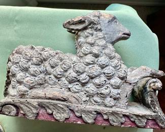 very old wood carved sheep