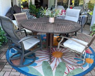 Teak table swival and rocking chairs
