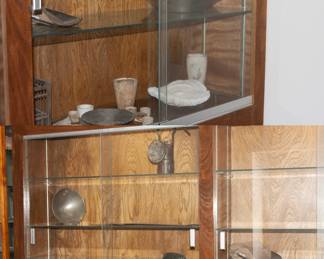 Old mining equipment (helmet, gold pan, lanterns, bird cage, signs)