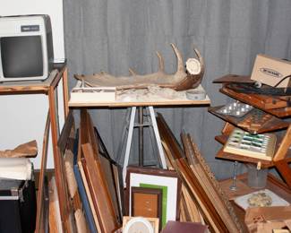 drafting table, moose antler, picture frames