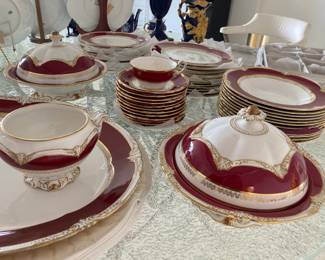 China set in burgundy and ivory with gold trim