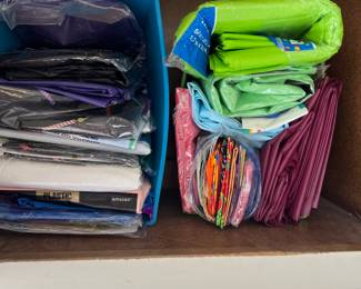 PLASTIC TABLECLOTHS AND PAPER GOODS