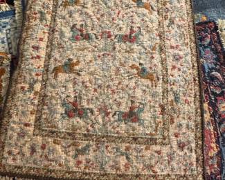 Handmade needlepoint rug for dollhouse