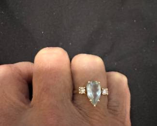 Blue topaz and two diamond ring 14kt