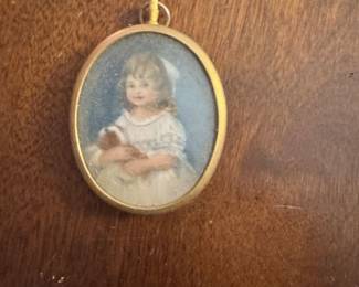 Antique miniature portrait of little girl and puppy