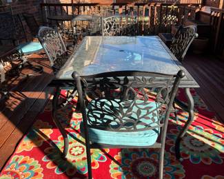 Glass top iron table w 6 chairs