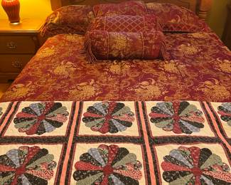 Printed quilt 
Bed , dresser , chest and night stand suite 