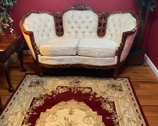 Love seat 
Area Rug