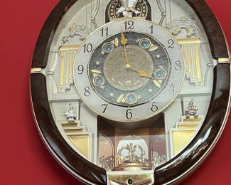 Melodies in motion clock 
Plays 7 different songs 
