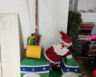 Lighted Santa in golf cart 