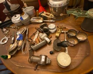 Lots of vintage and antique kitchen gadgets.