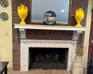 Yellow urns and vintage mirror