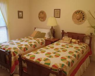 Twin beds, quilts