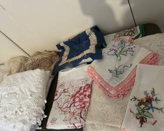 Look at that handwork and vintage tablecloth!