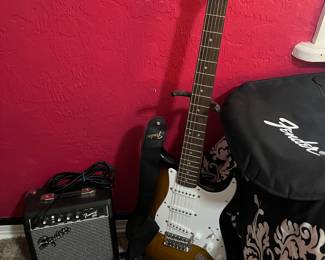 Electric Fender Squire Guitar and Amp