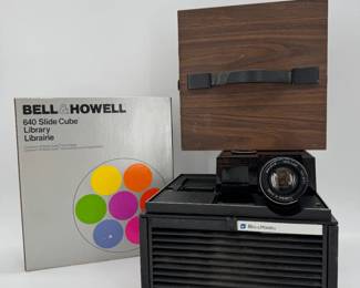 Lot - 63
Vintage Bell & Howell 981Q Slide Cube Projector - WORKS
