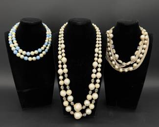 Lot - 83
Mid Century Multistrand Costume Jewelry Necklace Trio