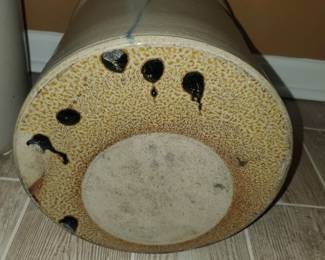 Wonderful turkey droppings and sign of the crock sitting on top (on the bottom) showing that the crock was fired upside down