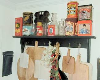 Advertising tins, milk bottles, cast iron mailbox & cutting boards