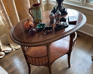 $480. Oval antique side table - vintage with shelf and rail detailing. as found. 35"w x 22"d x 29.5" h. Available for online purchase which opens Wednesday at 7pm.  See sale description to learn how to buy online. 