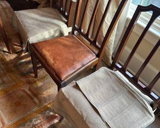$1200. Twelve dining chairs as found.  Six have covers as shown. All have leather seats.  Each measures 19"w x 17" x 37”h.  Available for online purchase when it opens Wednesday at 7pm.  See sale description to learn how to buy online. 