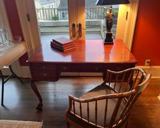 $320.  Antique Partner's Desk with clawed feet, five drawers on each side.  As found issue on the surface - age commensurate.   48"w x 32"d x 29"h. Available for online purchase which opens Wednesday at 7pm.  See sale description to learn how to buy online. 